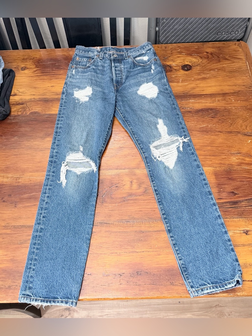 Levi’s distressed blue jeans 25x30